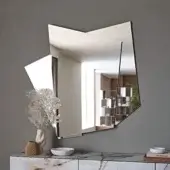 Innovative Cattelan Italia Risiko mirror in refined mirrored glass with interconnected geometric sections and glossy finish