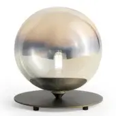 Gold table lamp, spherical shape, sputtering finish, with concave dish base and dark gray circular feet, studio shot.