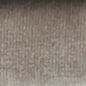 Heathered gray textile sample displaying a dense, nubby weave with mélange yarn construction suitable for upholstery applications.