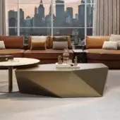 Innovative Reflex Origami coffee table with geometrically faceted wood structure and muted gold finish