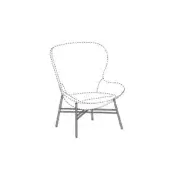 Armchair line drawing, metal base, rounded seat and back, dashed outline, angled legs, neutral matte finish, curved silhouette, white background.