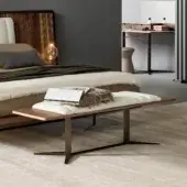 Elegant Bonaldo Nelson bench with veneered Canaletto Walnut wood and light beige cushion atop a metal base