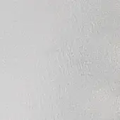 Light gray granular texture fills the frame, displaying a mottled, uneven surface with subtle tonal variations and diffuse, shadowless lighting.