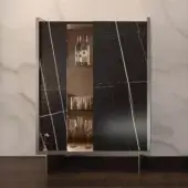 Innovative Reflex Uro cupboard, a wooden structure clad in Marble glass mimicking black marble with white and gold veining and a glass section