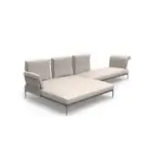 Modular sofa, beige linen upholstery, L-shape configuration with angled cushions and dark gray tapered metal legs, minimalist design.