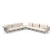 Modular sectional sofa, light beige fabric, L-shape with square cushions and low profile, dark gray legs, minimalist studio setting.