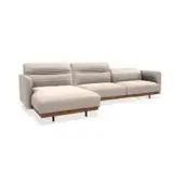 Modular sectional sofa, beige upholstery, vertical pleating detail, dark brown wood base, black metal legs, contemporary design.