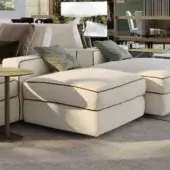 Distinguished Reflex Adone ottoman with light beige textured fabric and refined olive green trim