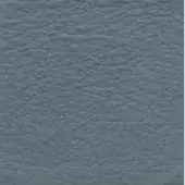 Slate-blue textured surface with a rippled, matte finish and uneven peaks, presented in diffuse, even lighting with a cool tone.