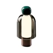 Table lamp, teal and smoked gray glass, with rounded top and cylindrical body, featuring illuminated white rectangular core and dark gray base.