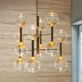 Superior Bonaldo Sofi suspension lamp with thirteen warm amber borosilicate glass globes and burnished brass cylinders