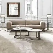 Refined DV Home Collection Hollywood coffee table with stainless steel base and white lacquered round tabletop in bronze matte finish