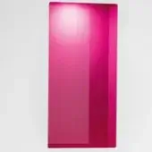 Magenta mirror with glossy finish, vertical groove detail, gradient pink tone, and white backdrop; Tonelli specchi aperture text visible.