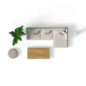 Modular sectional sofa, beige linen, angled armrest, with wood slat coffee table, green banana leaf plant, and woven stool on white surface.