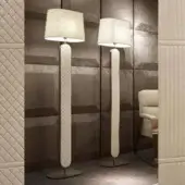 Distinguished DV Home Collection Coco floor lamp with quilted light beige leather and a light textile lampshade crafted in satin light brown accents