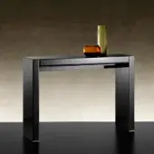 Avant-garde Reflex console crafted in shiny lacquered wood with bevelled lacquered glass top and drawer fronts exhibiting minimalist design