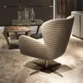 Distinctive DV Home Collection Elite lounge chair with refined beige fabric upholstery and hexagonal quilted finish