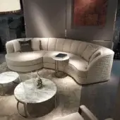 Refined DV Home Collection Charlotte Island sofa with light beige textile upholstery and hexagonal quilted sides