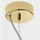 Brass canopy, circular flared shape, with central cylindrical fitting and silver-gray suspension cables against a light gray backdrop.
