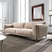 Distinctive DV Home Collection Elite sofa with light beige fabric upholstery and Cannetè quilting on a solid wood and metal structure