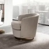 Elegant DV Home Collection Coco lounge chair with neutral beige textile upholstery and swivel stainless steel base