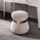 Innovative DV Home Collection Coco ottoman with a light beige fabric covering and refined steel insert