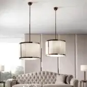 Elegant DV Home Collection Windsor lamp with white cannetè fabric and a reflective metal structure