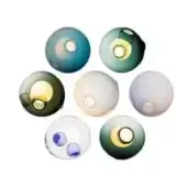 Wall sconces, gradient glass shades, circular arrangement, teal, olive, amber, gray, and pale blue tones, warm light, minimalist design.