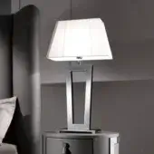 Elegant DV Home Collection Deco table lamp with white fabric lampshade and glossy metal frame crafted in Italy