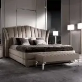 Exceptional DV Home Collection Vanity bed with taupe fabric, curved headboard and sleek metal trim