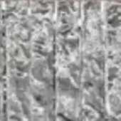 Hand-made glass panel with vertically arranged circular and oval shapes, mottled texture, grayscale tones, and irregular layered construction.