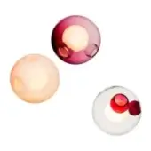 Blown glass wall lights, burgundy, peach, and clear glass with ruby inclusions, spherical shape with circular cutouts, white background.