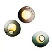 Spherical wall lights, translucent glass, smoky brown, olive green, and teal hues, featuring large circular openings and recessed details.