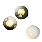Blown glass wall sconces, forest green, smoky gray, and white, featuring spherical layered shades and asymmetrical circular openings.