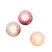 Spherical wall lights with translucent glass, featuring rose, amber, and peach hues, display irregular bubble indentations and diffused illumination.