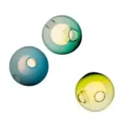 Blown glass wall lights, teal, blue, and yellow-green, spherical shape with circular openings emitting warm light, minimalist modern design.