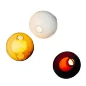 Spherical wall lights, glass, varying colors: white, amber, burgundy with orange core, golden yellow with circular openings, central apertures.