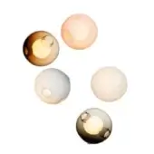 Ceiling lights, spherical glass shades, clustered arrangement with smoky brown, peach, and white tones, diffused light, circular openings.