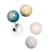 Spherical wall lights, varying teal, yellow, clear glass, white & lavender hues, feature circular cutouts & minimalist modern design.