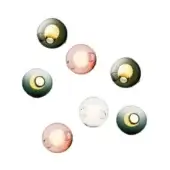 Spherical wall lights with rippled glass shades in green, pink, and amber tones, mounted on dark metal circular plates against a white backdrop.