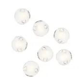 Glass pendant lights with frosted orbs and curved metal arms emit a warm yellow glow against a white backdrop.