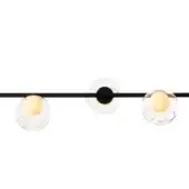 Linear suspension light, black metal, three clear glass globes with Edison bulbs, minimalist design, studio lighting.