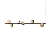 Suspended light fixture, black metal, with multiple amber and neutral glass pendants of varying sizes arranged asymmetrically from a horizontal bar.