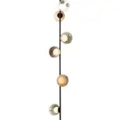 Suspension light fixture, black metal, eight hand-blown glass orbs in amber, gold, and neutral tones with green tints, vertical arrangement.