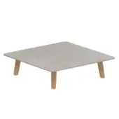Pale gray granular square surface is supported by four light-toned, vertically grained cylindrical legs on a white background