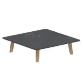 Dark square surface with branching linear patterns is supported by four angled, light-toned legs
