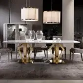 Distinguished DV Home Collection Deco table with stainless steel base and white marble-like tabletop in glossy gold finish