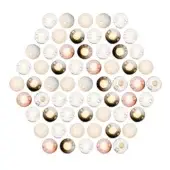Glass orb light fixtures in clear, frosted white, amber, and rose tones are clustered against a white backdrop, displaying internal reflections.