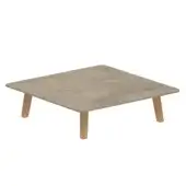 Gray and beige mottled square surface rests on four tapered cylindrical supports with visible wood grain