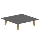 Dark gray square surface with rounded corners rests on four angled, light-toned legs with visible grain